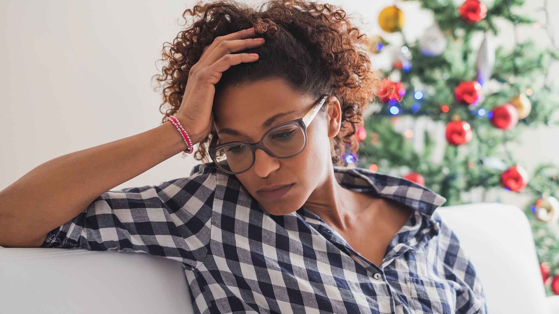 PTSD and Holiday Stress symptoms affecting a woman