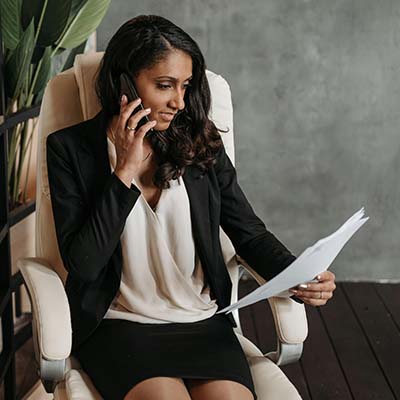 Woman reviewing difference between in-network and out-network Benefits for Therapy