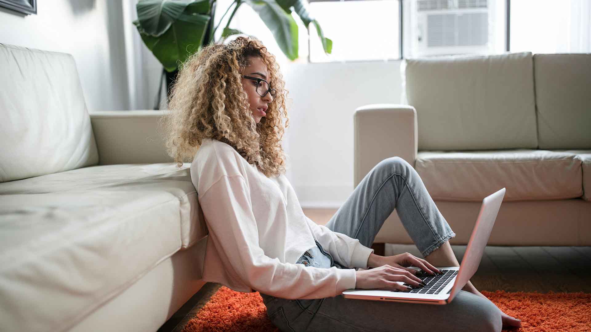 Woman reviewing out-of-network reimbursement details for therapy